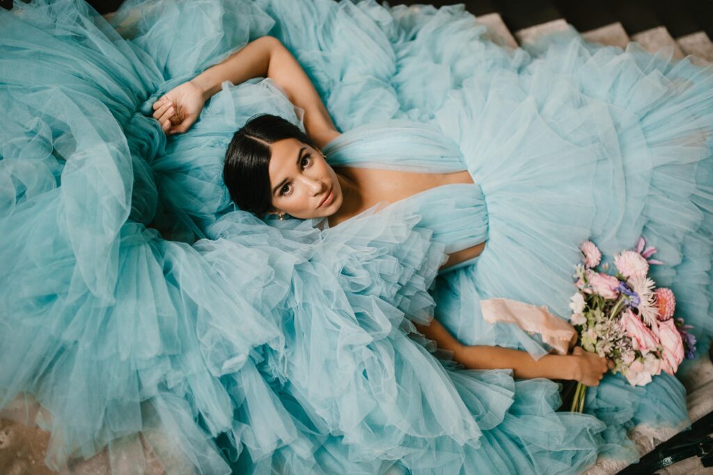 Portrait of bride in a millia london blue gown. 