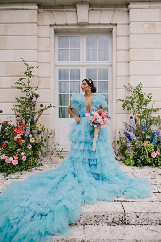 Bride in front of french castle wedding. 