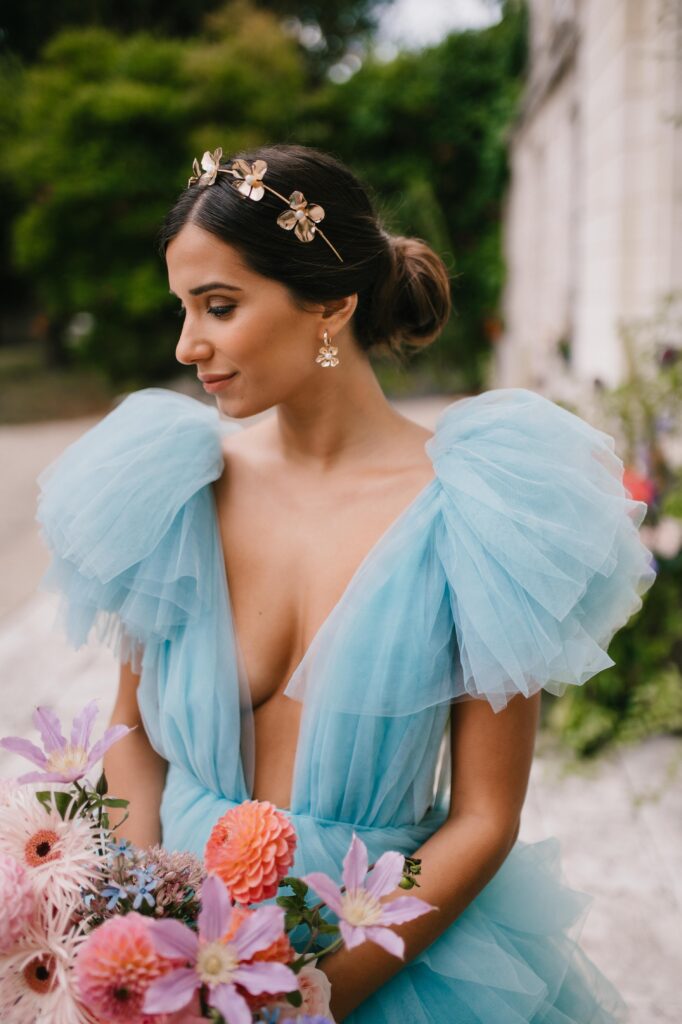 Bride wearing Ashley Wild Bridal accessories and hair pieces. 