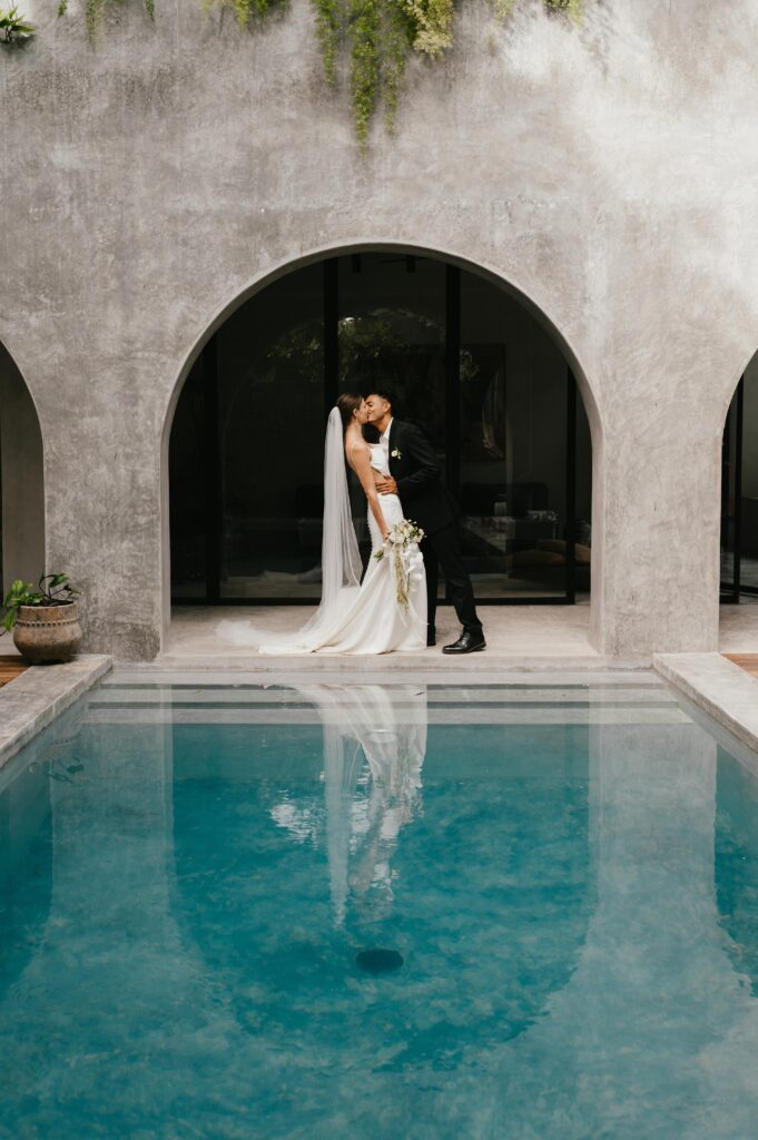Bride and groom kissing after their Tulum elopement, Mexico. 