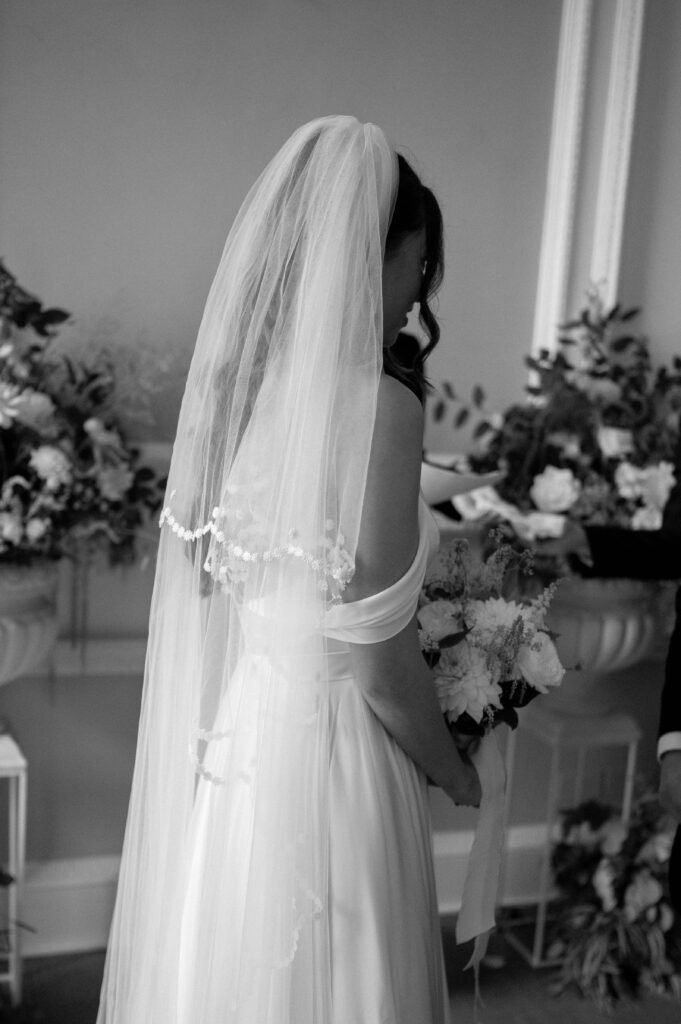 Close up of Charlie's dress by Sassi Holford Bridal.