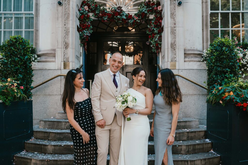 Family portraits on the steps of Chelsea Old Town Hall. 