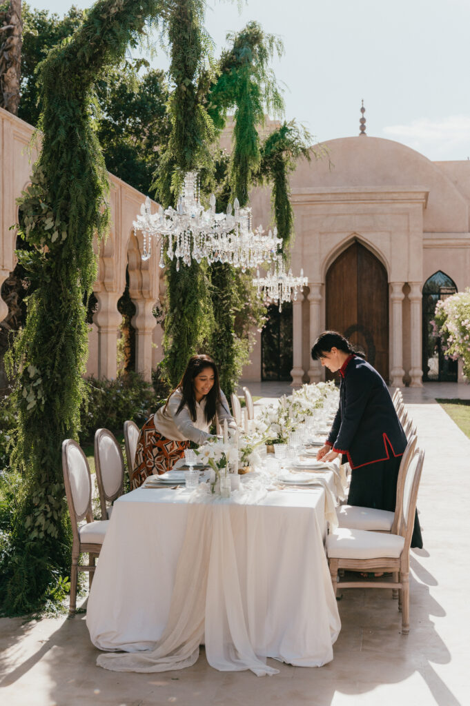 Siham from La Perle Events Marrakech and Maria from party Maroc finalising the details of the wedding breakfast table. 